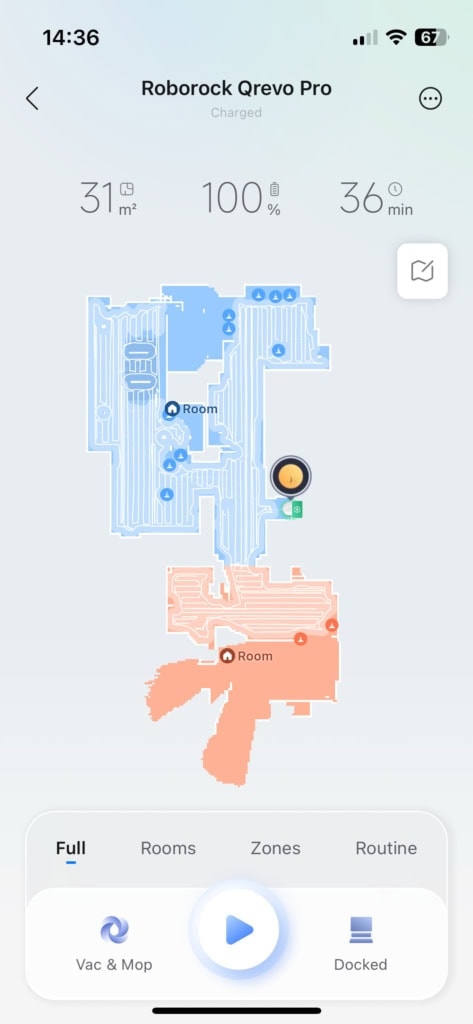 Ikona nad odkurzaczem wskazuje jego status – na przykład pranie lub suszenie mopów